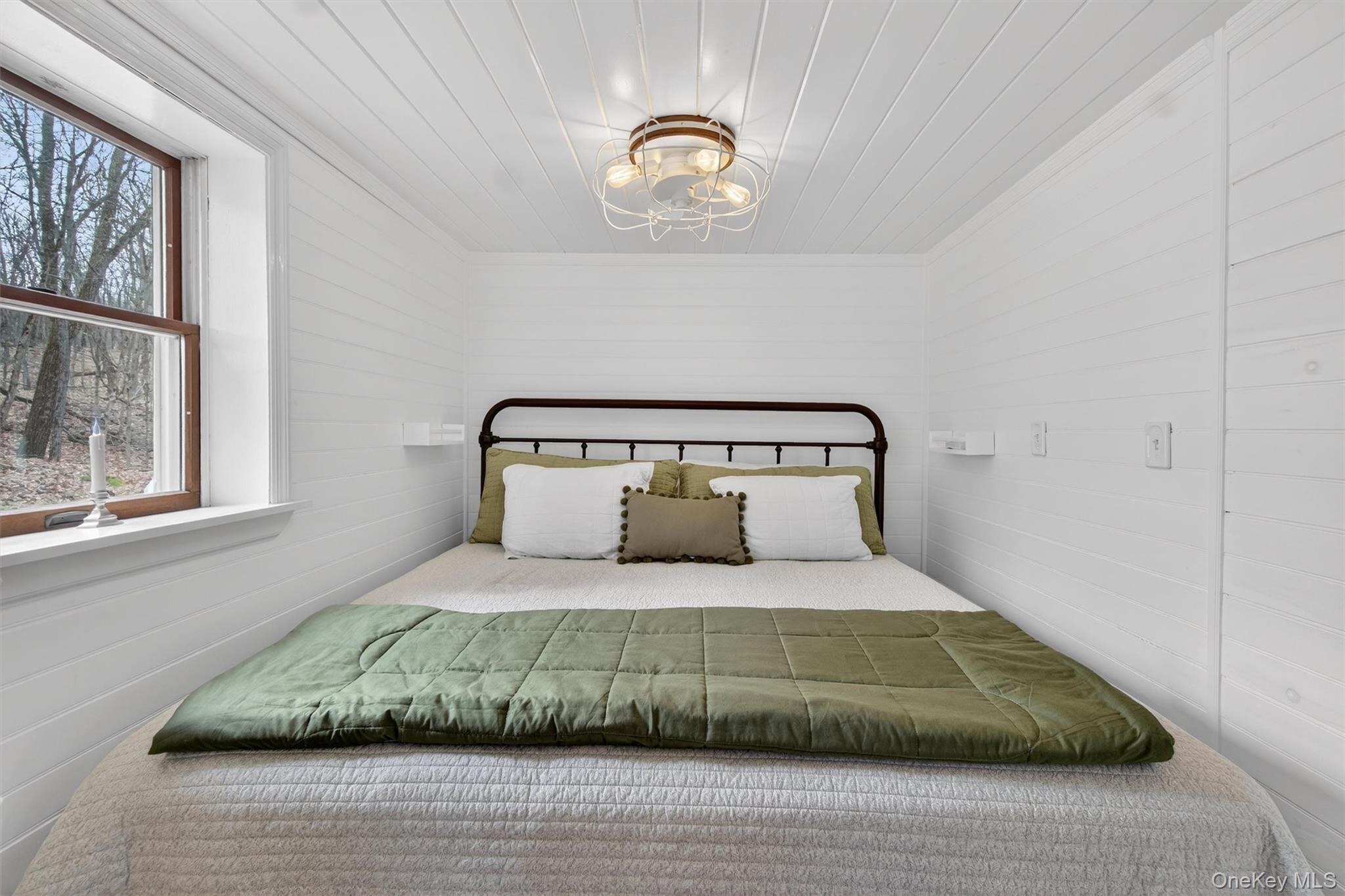 58 Oxford Springs Road Chester, NY 10918 - Photo 23 of 38 Bedroom with wood ceiling and wooden walls