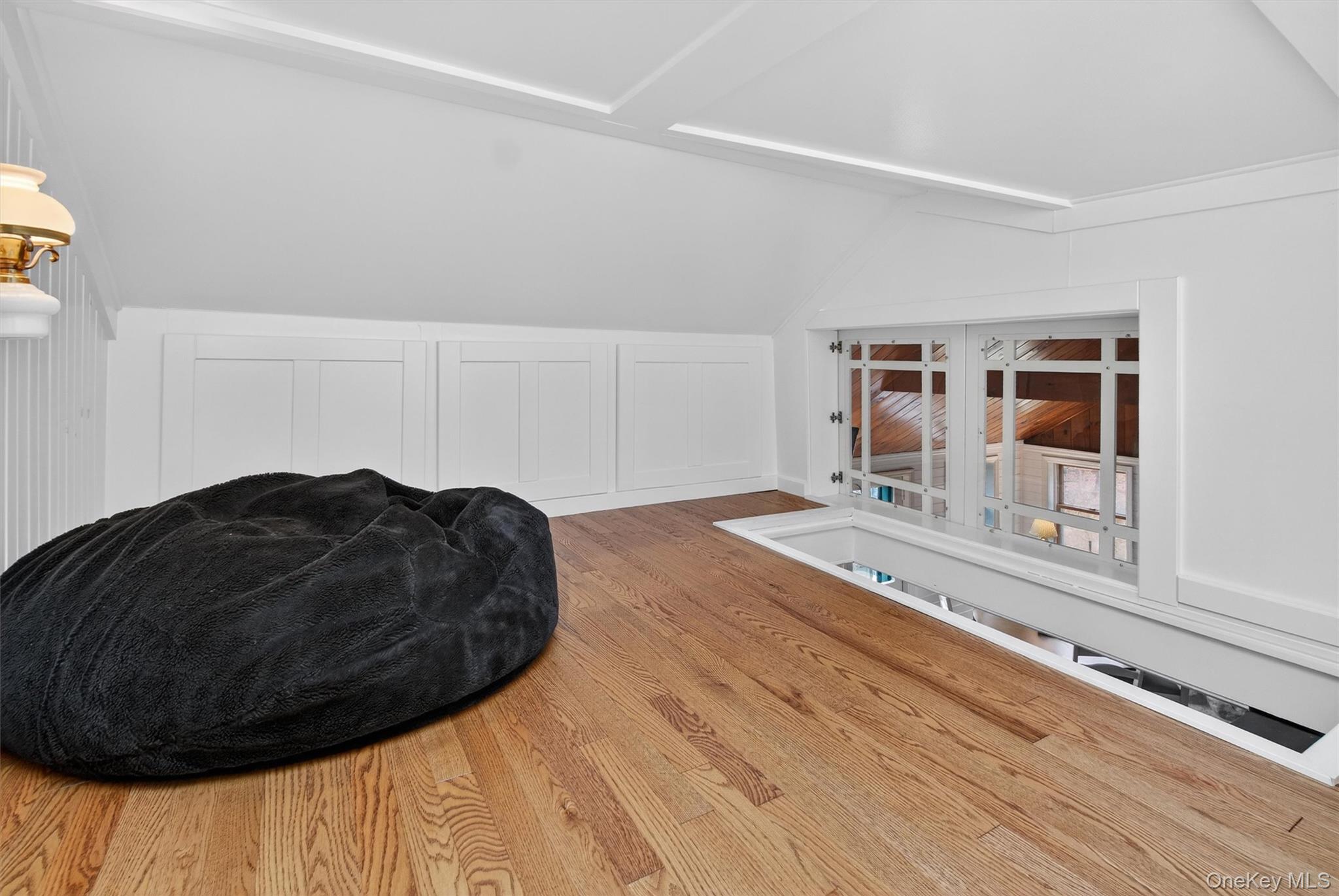 58 Oxford Springs Road Chester, NY 10918 - Photo 27 of 38 Additional living space with wood finished floors and vaulted ceiling