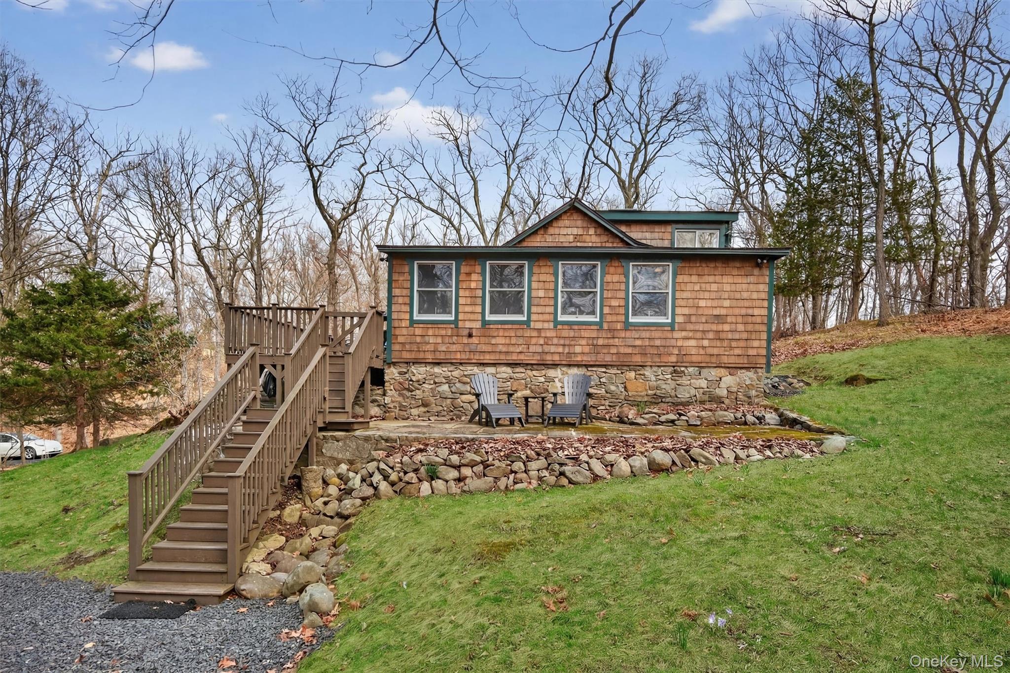 58 Oxford Springs Road Chester, NY 10918 - Photo 3 of 38 View of the side of the home featuring a yard, a patio, and a wooden deck