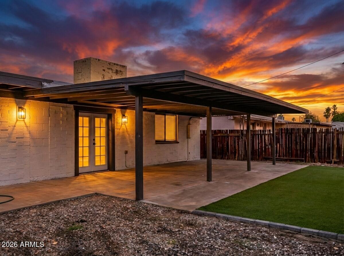 3619 West Griswold Road Phoenix, AZ 85051 - Photo 43 of 45 back yard twilight
