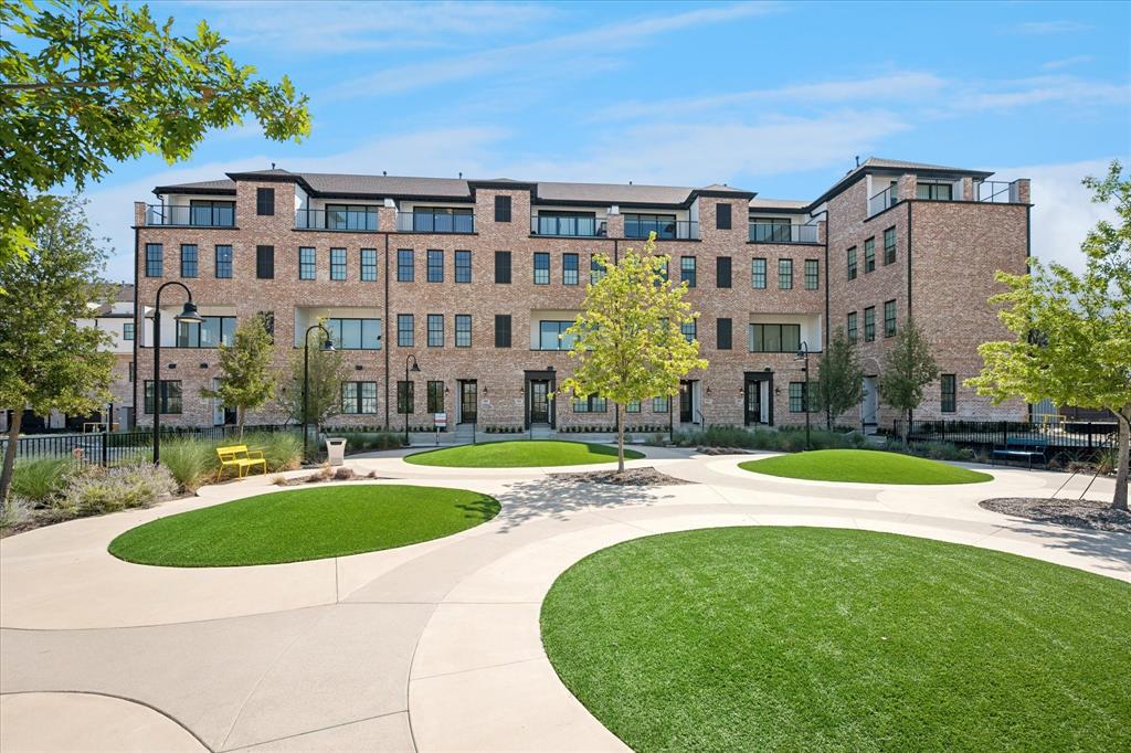 6011 Laurel Lane Addison, TX 75001 - Photo 1 of 33 a view of a house with a swimming pool