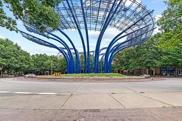a view of a pathway with a park