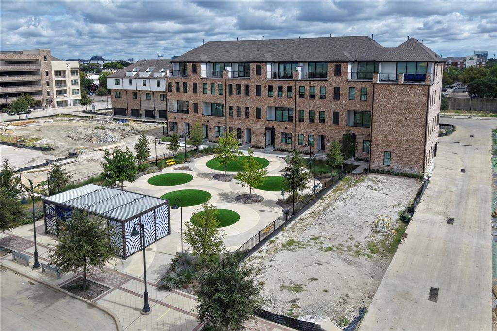 6011 Laurel Lane Addison, TX 75001 - Photo 31 of 33 a view of a patio with table and chairs and potted plants