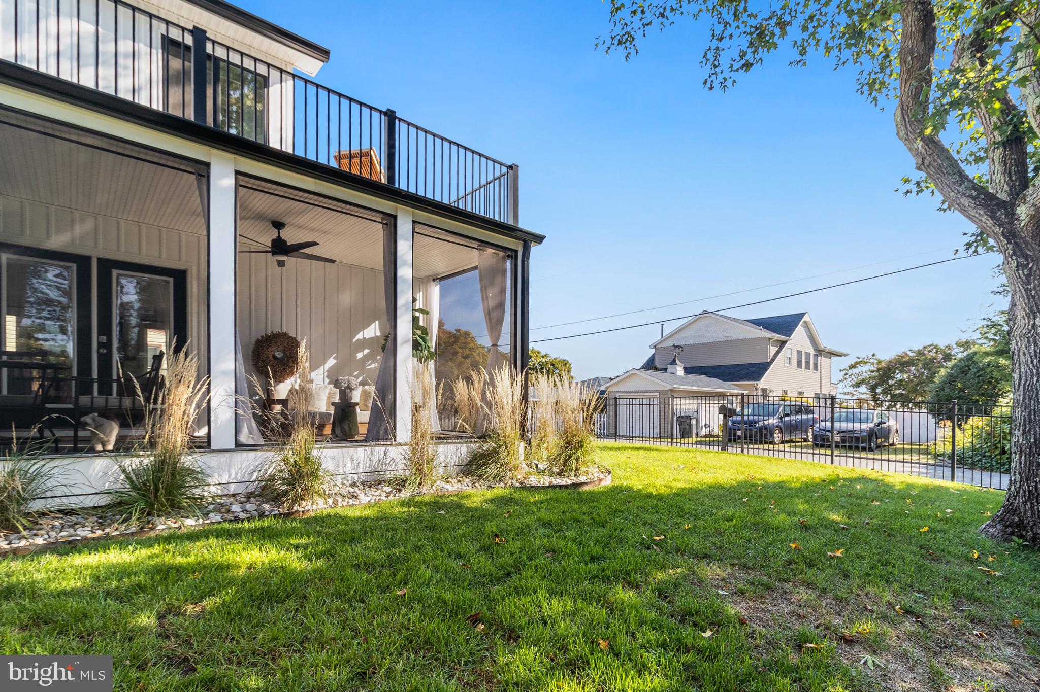 84 Chesapeake Avenue Prince Frederick, MD 20678 - Photo 13 of 42 a view of a house with a yard