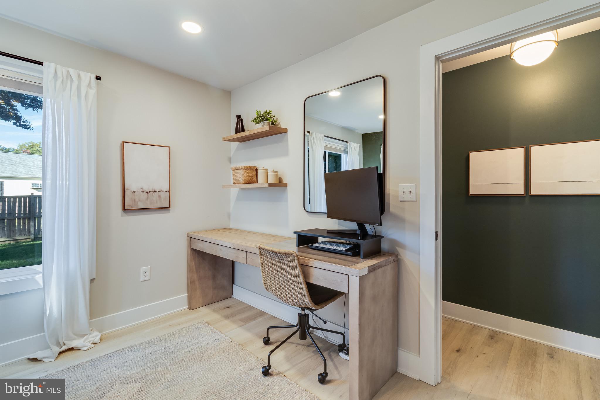 84 Chesapeake Avenue Prince Frederick, MD 20678 - Photo 18 of 42 a workspace with furniture and window