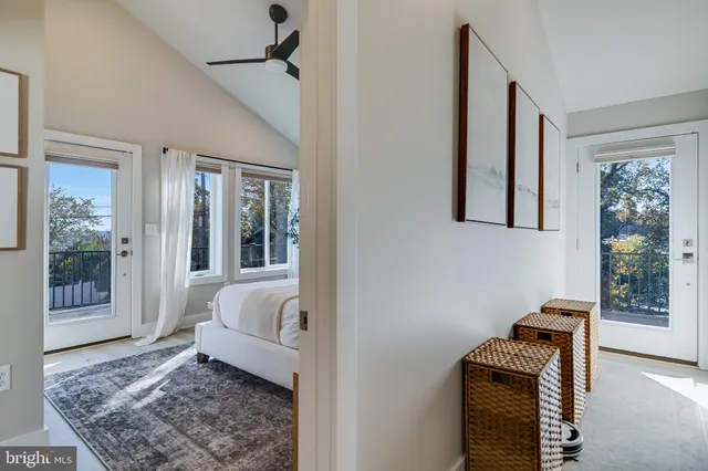 a bedroom with furniture and a window