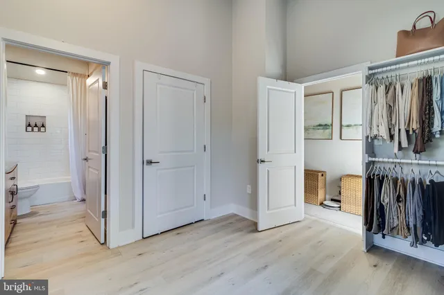 a view of entryway with wooden floor