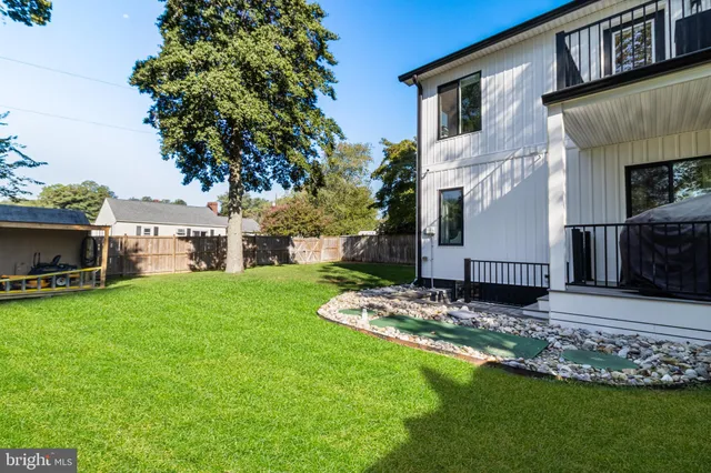 a view of a back yard of the house