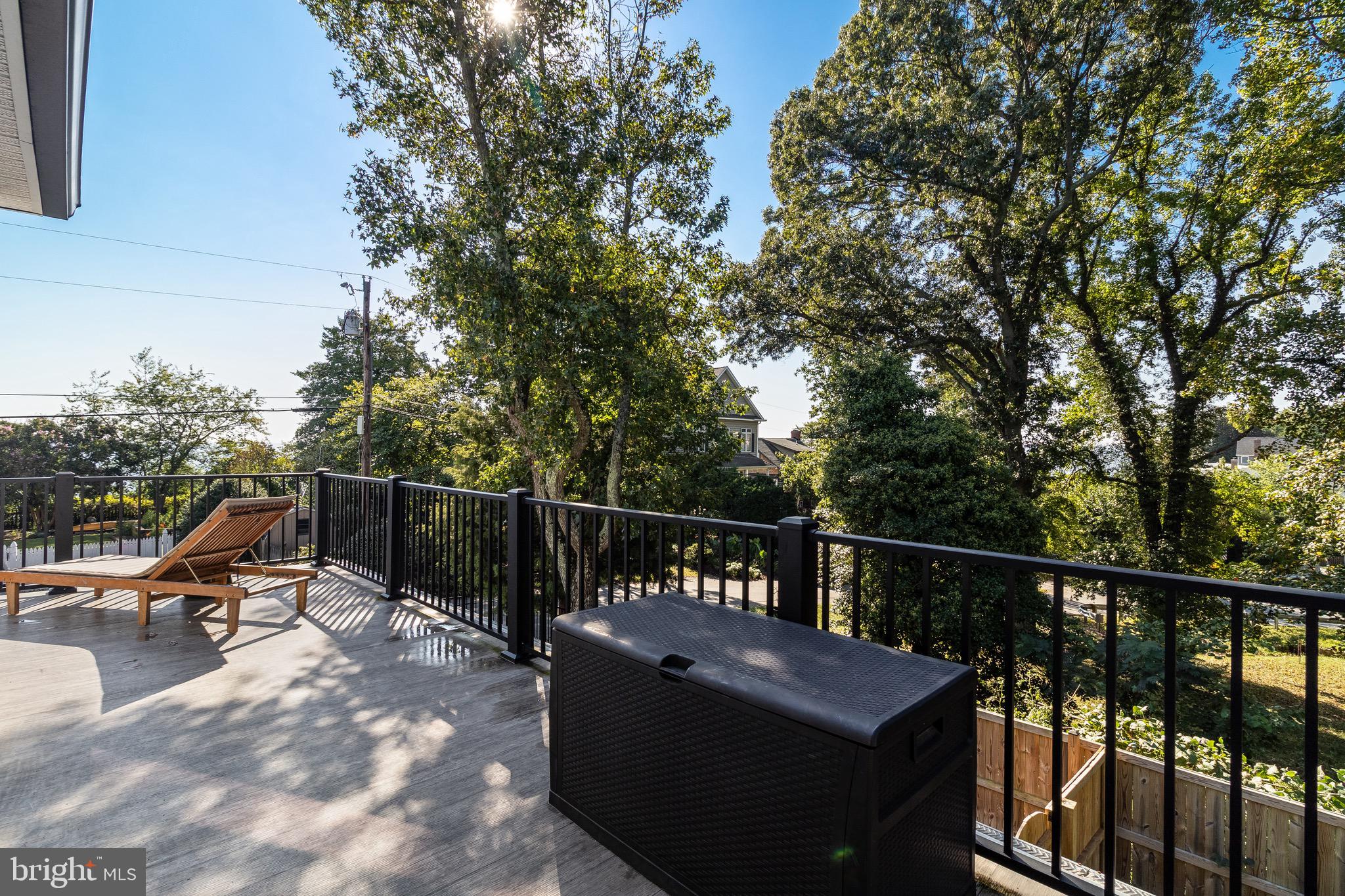 84 Chesapeake Avenue Prince Frederick, MD 20678 - Photo 37 of 42 a view of roof deck with furniture and trees