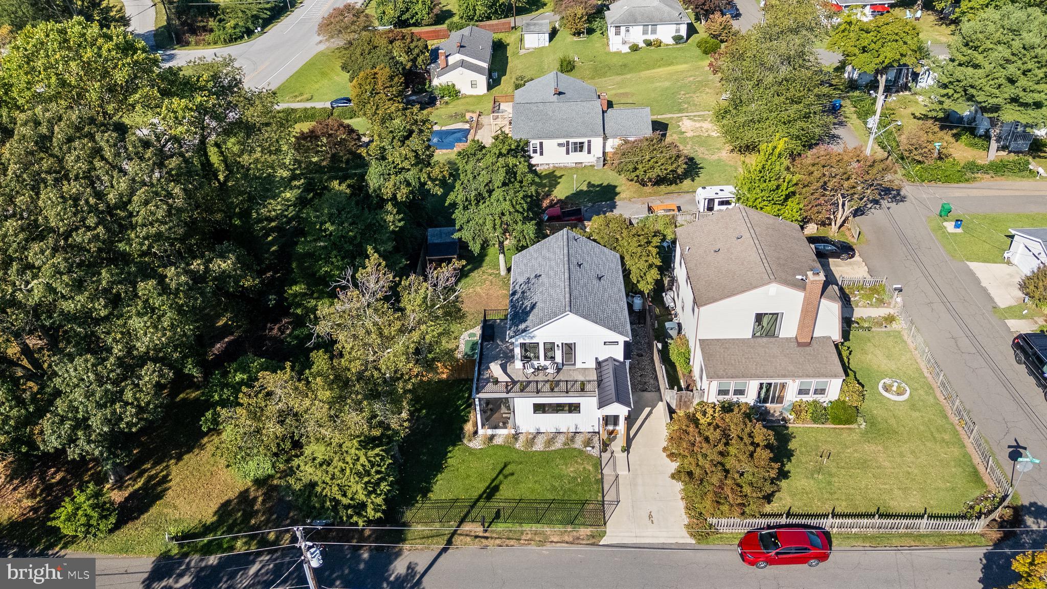 84 Chesapeake Avenue Prince Frederick, MD 20678 - Photo 38 of 42 an aerial view of residential houses with outdoor space