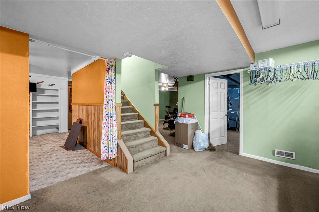 3830 Jerusalem Road Vermilion, OH 44089 - Photo 32 of 49 Finished basement featuring carpet and a textured ceiling