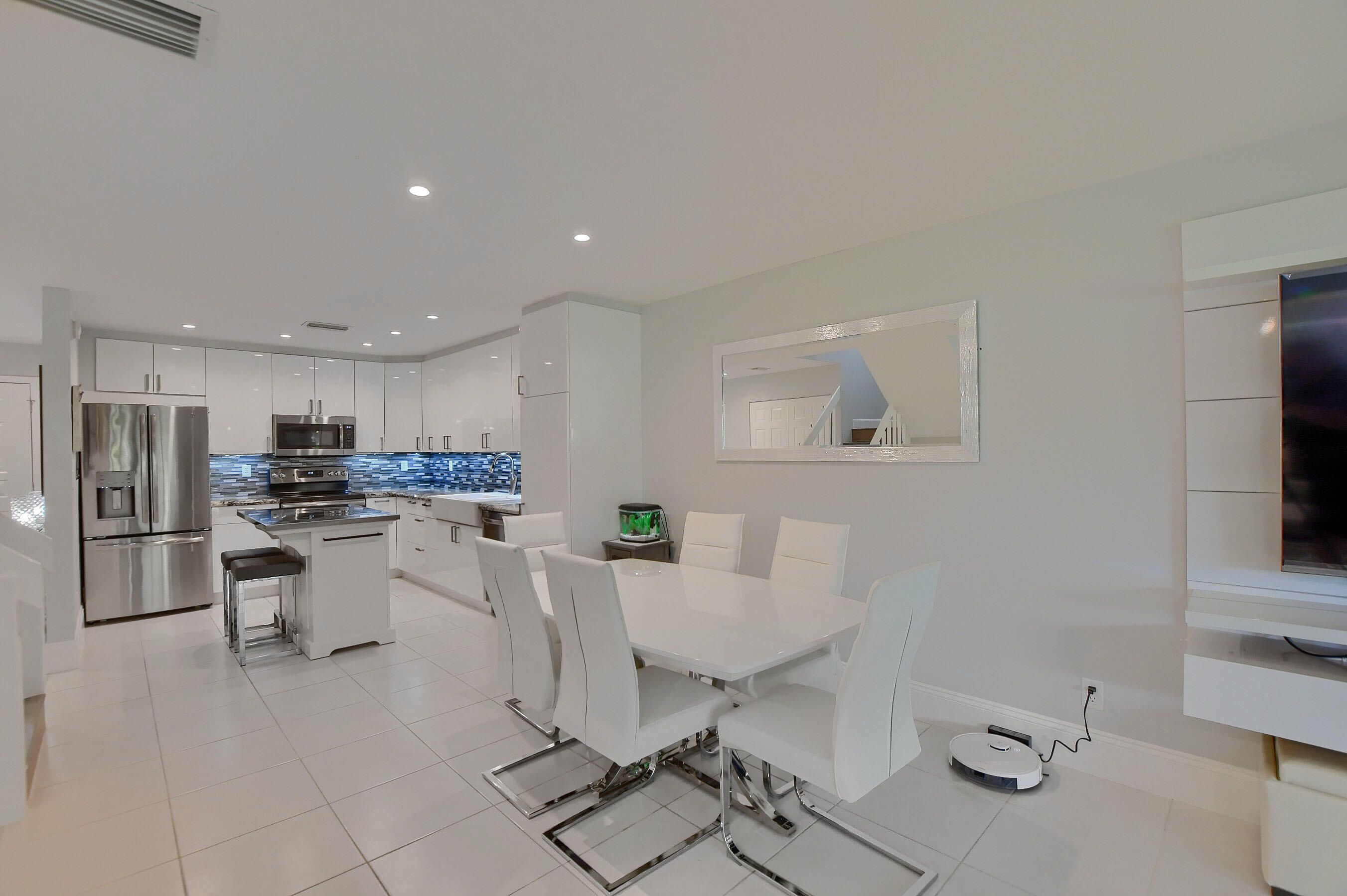 8939 Southwest 21st Court, Unit E Boca Raton, FL 33433 - Photo 14 of 38 Dining Room