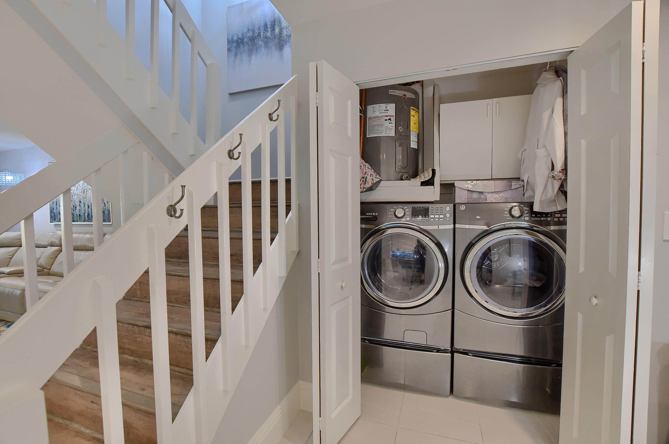 8939 Southwest 21st Court, Unit E Boca Raton, FL 33433 - Photo 18 of 38 Laundry Closet