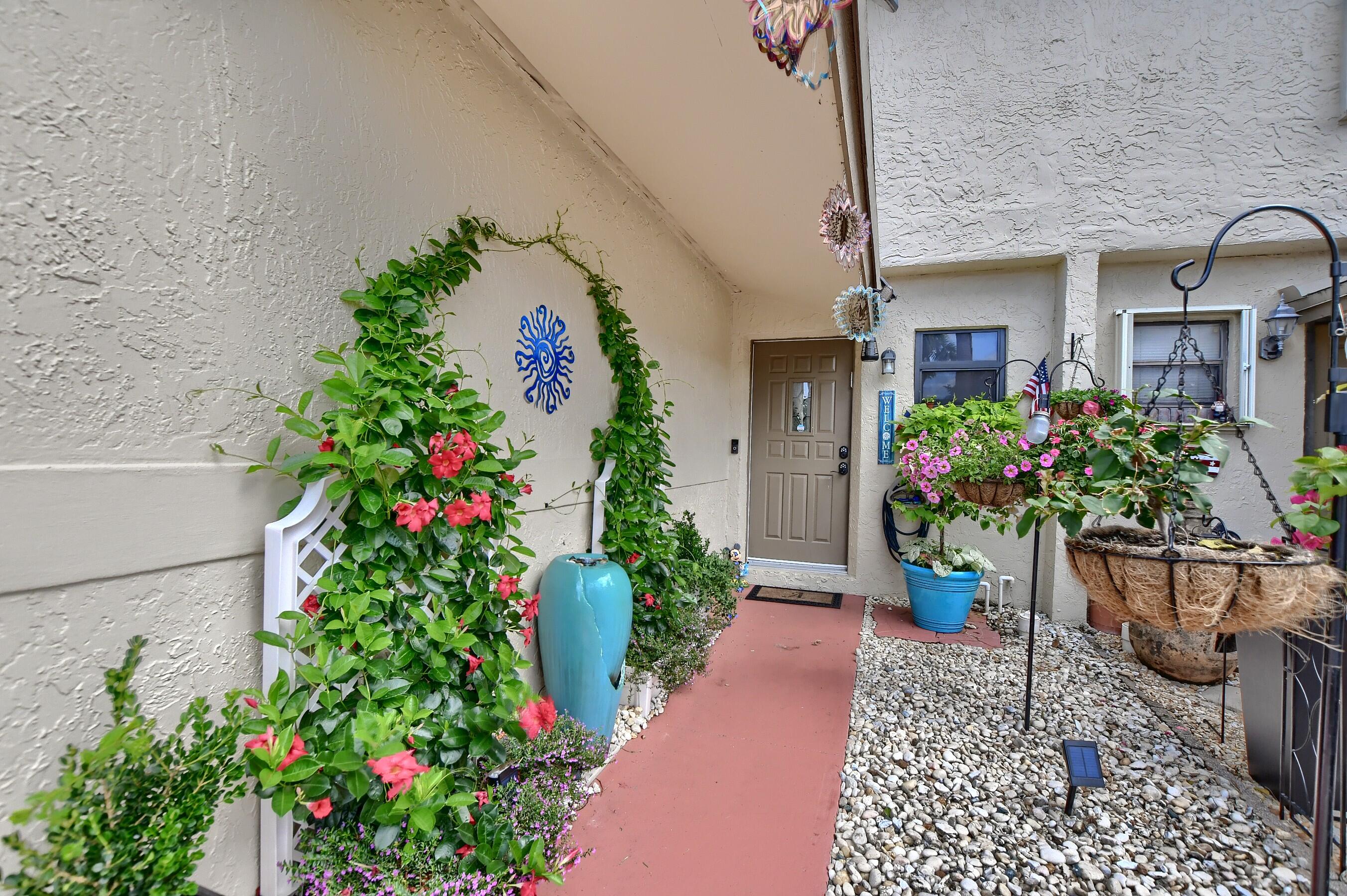 8939 Southwest 21st Court, Unit E Boca Raton, FL 33433 - Photo 2 of 38 Walk Way