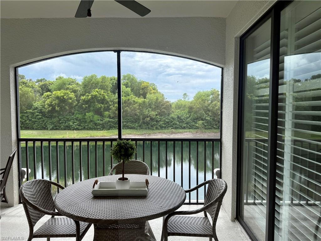 9498 Napoli Lane, Unit 201 Naples, FL 34113 - Photo 43 of 48 a view of a dining room with furniture window and outside view