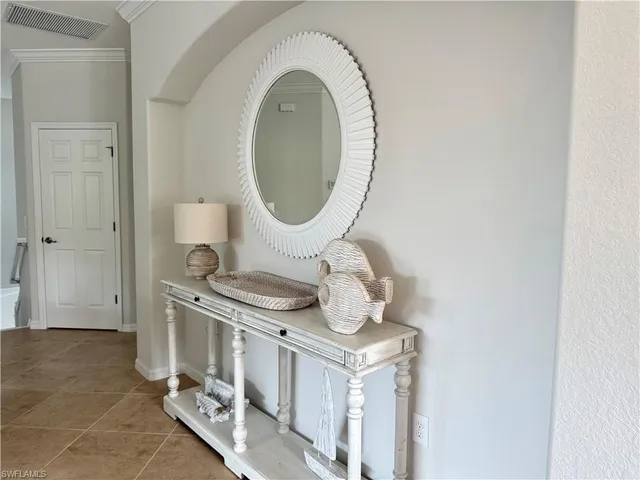view of a bathroom with a sink and a mirror