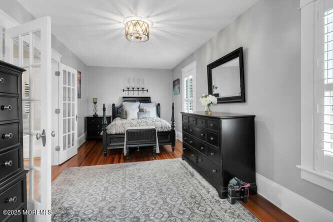 137 East Bergen Place Red Bank, NJ 07701 - Photo 17 of 40 a living room with furniture a rug and a window