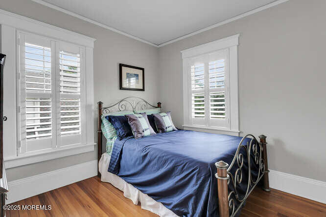 137 East Bergen Place Red Bank, NJ 07701 - Photo 20 of 40 a bedroom with a bed and a window
