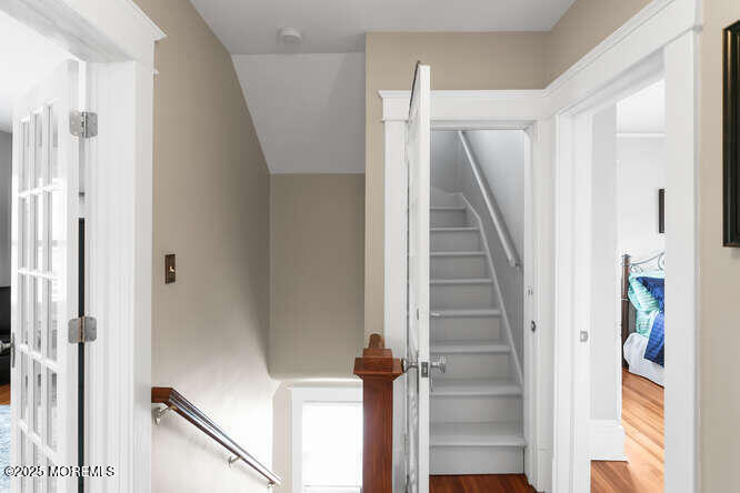 137 East Bergen Place Red Bank, NJ 07701 - Photo 21 of 40 a view of a hallway with wooden floor and entryway