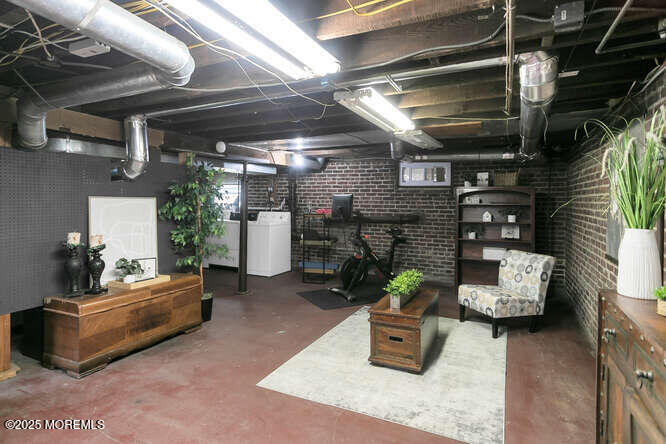 137 East Bergen Place Red Bank, NJ 07701 - Photo 28 of 40 a building outdoor space with patio furniture and potted plants