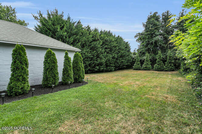 137 East Bergen Place Red Bank, NJ 07701 - Photo 38 of 40 a view of a house with a garden