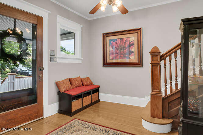 137 East Bergen Place Red Bank, NJ 07701 - Photo 4 of 40 a living room with furniture a rug and a window