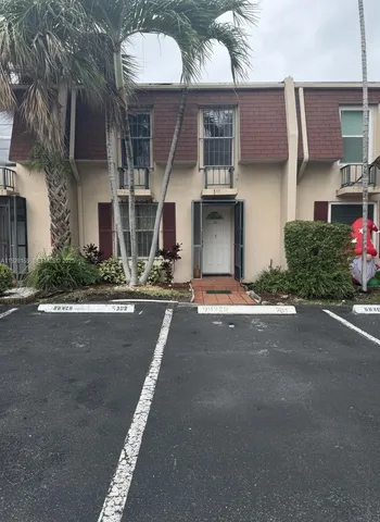 front view of a house with a street