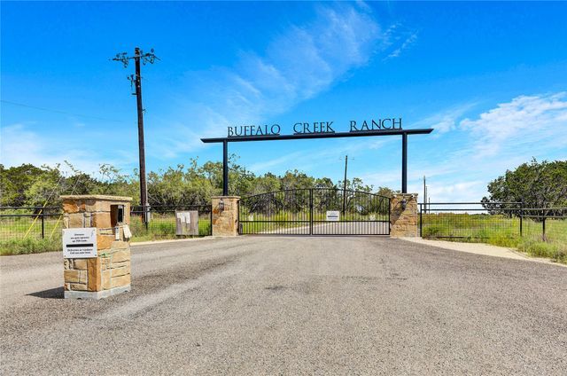 a view of a city street from a balcony