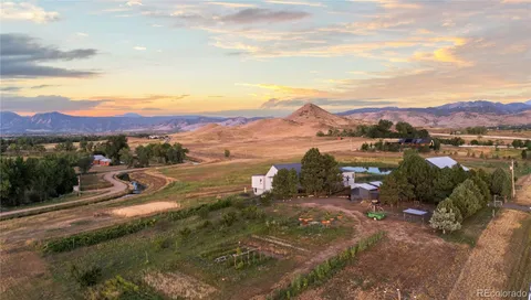 a view of a lake with houses in the back