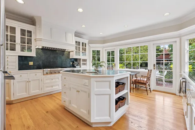 a kitchen with counter top space and appliances