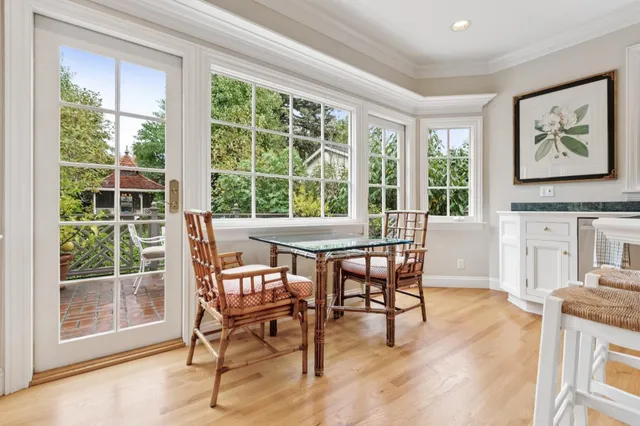 a view of a living room and hardwood floor