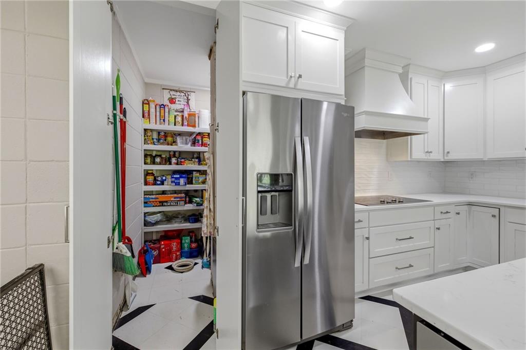 490 Maple Street Cornelia, GA 30531 - Photo 16 of 88 a kitchen with stainless steel appliances a refrigerator sink and cabinets
