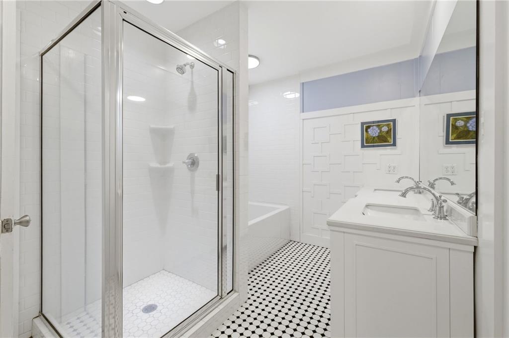 490 Maple Street Cornelia, GA 30531 - Photo 24 of 88 a bathroom with a sink a toilet and shower