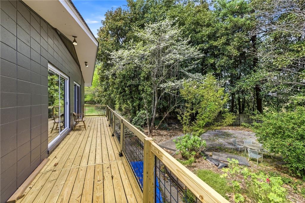 490 Maple Street Cornelia, GA 30531 - Photo 46 of 88 a view of balcony with wooden floor and fence