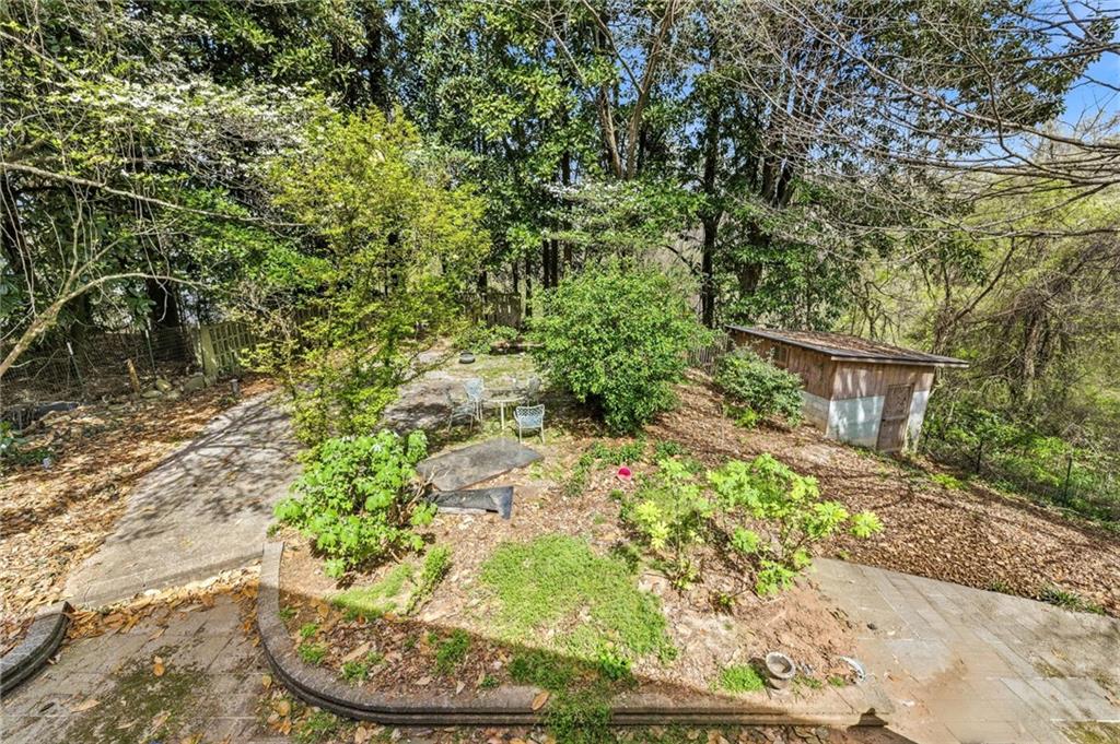 490 Maple Street Cornelia, GA 30531 - Photo 47 of 88 a backyard of a house with a yard and fountain