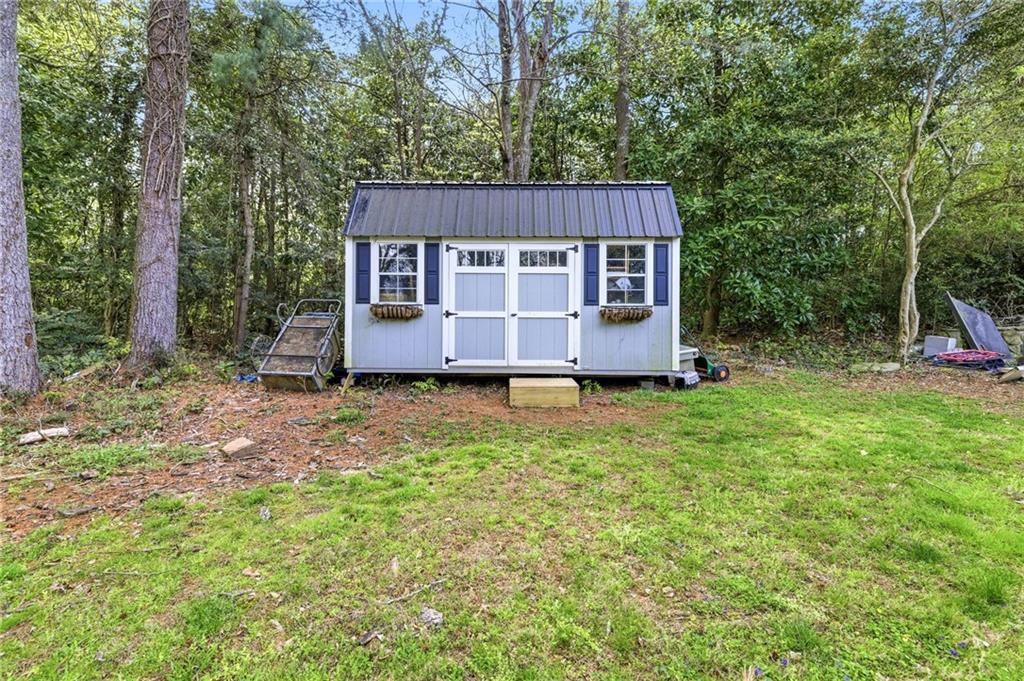 490 Maple Street Cornelia, GA 30531 - Photo 55 of 88 a view of a house with backyard and garden