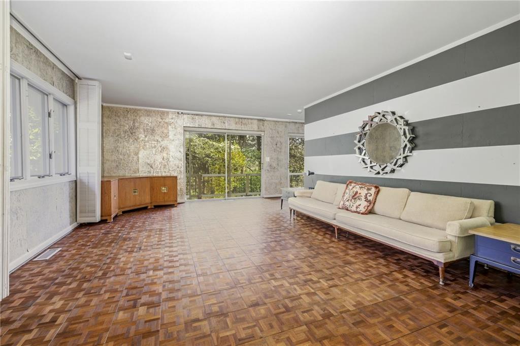 490 Maple Street Cornelia, GA 30531 - Photo 7 of 88 a living room with furniture and a window
