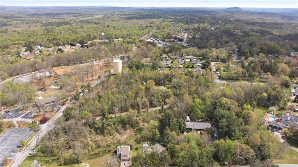 490 Maple Street Cornelia, GA 30531 - Photo 71 of 88 an aerial view of residential houses with outdoor space and trees