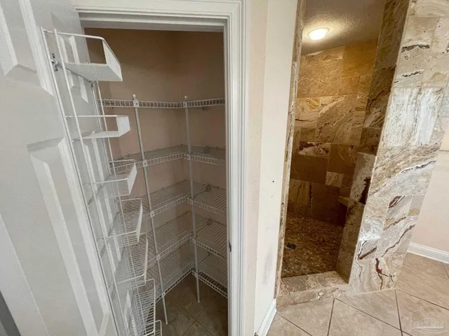 a view of a room with racks on the wall