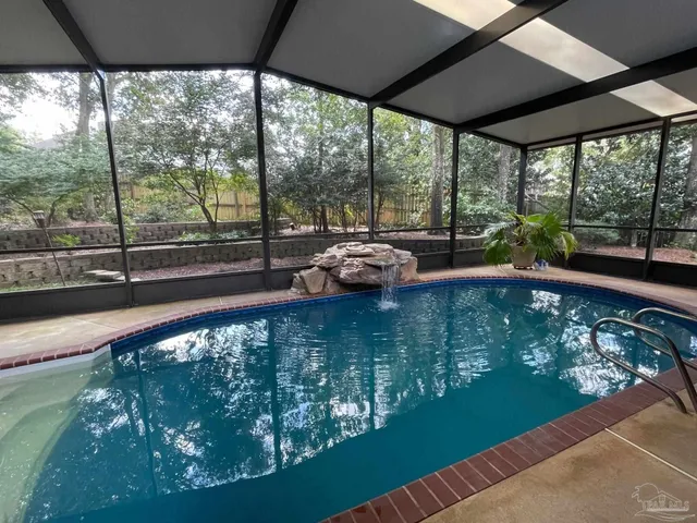 a view of a floor to ceiling window in an outdoor space