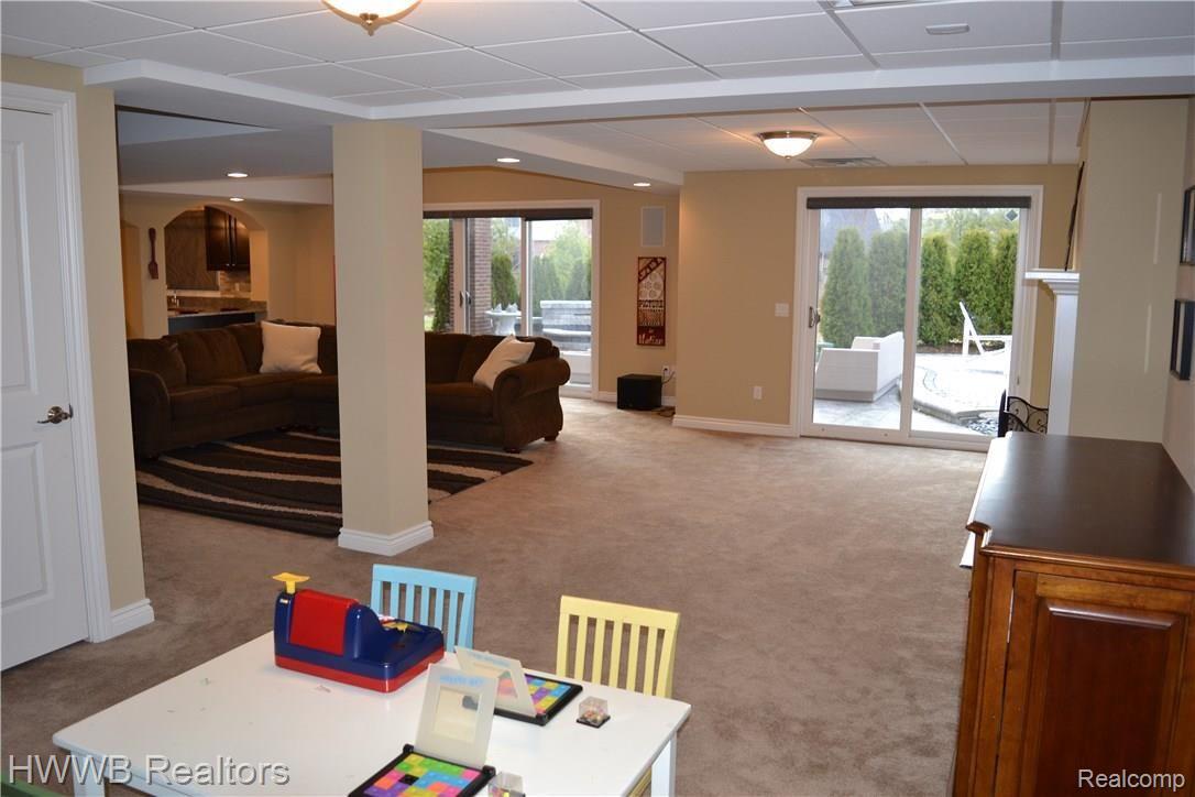 5676 Sovereign Drive Rochester, MI 48306 - Photo 52 of 68 Play Area to Doorwalls