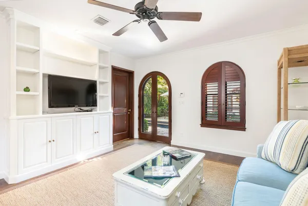a spacious bathroom with a sink double vanity and a mirror