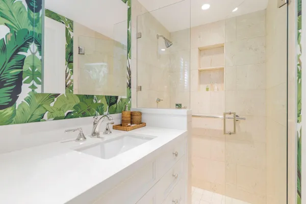 a bathroom with a sink and a shower