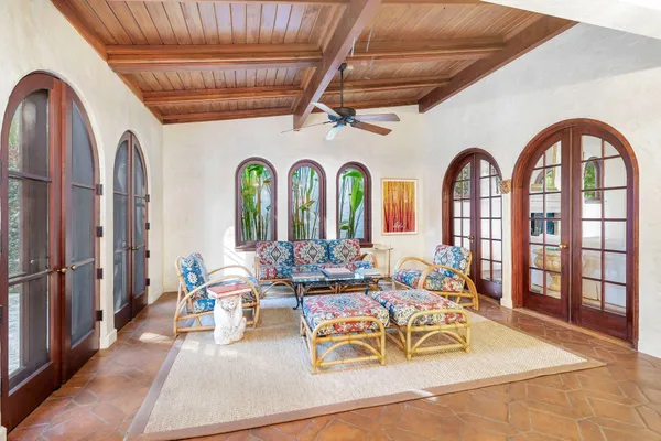 a view of living room filled with furniture