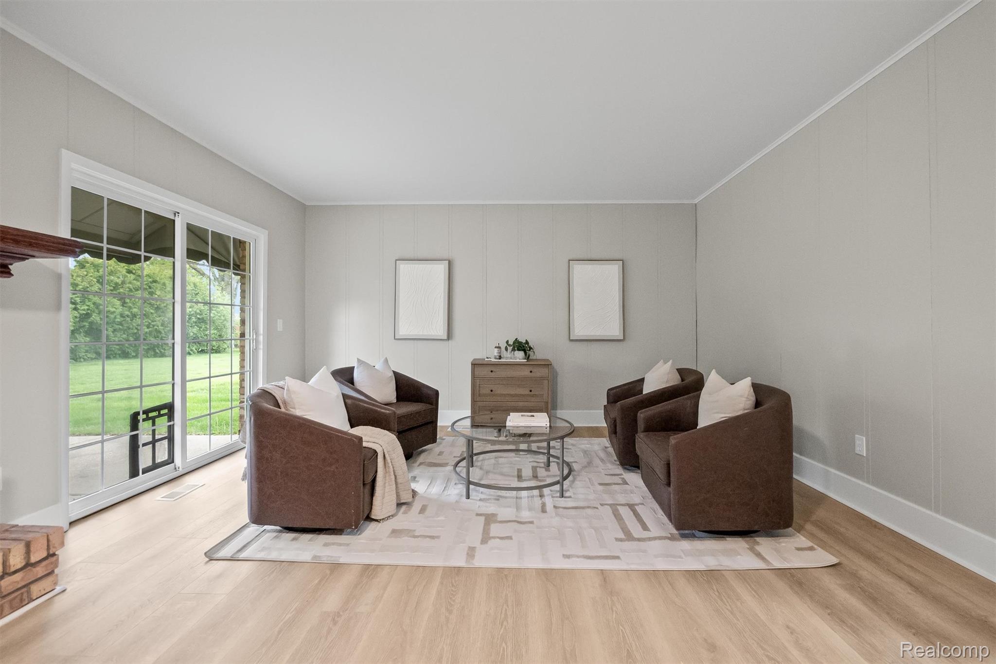 11326 Common Road Warren, MI 48093 - Photo 11 of 35 Living room with light wood-style floors