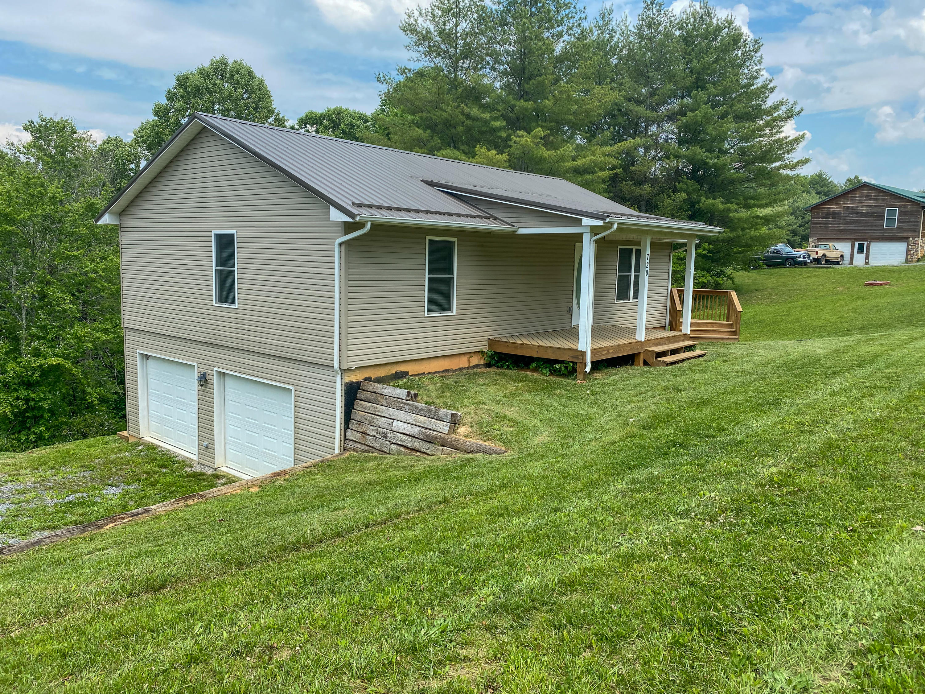 729 Huffville Road Northeast Pilot, VA 24138 - Photo 2 of 13 a view of a house with a yard