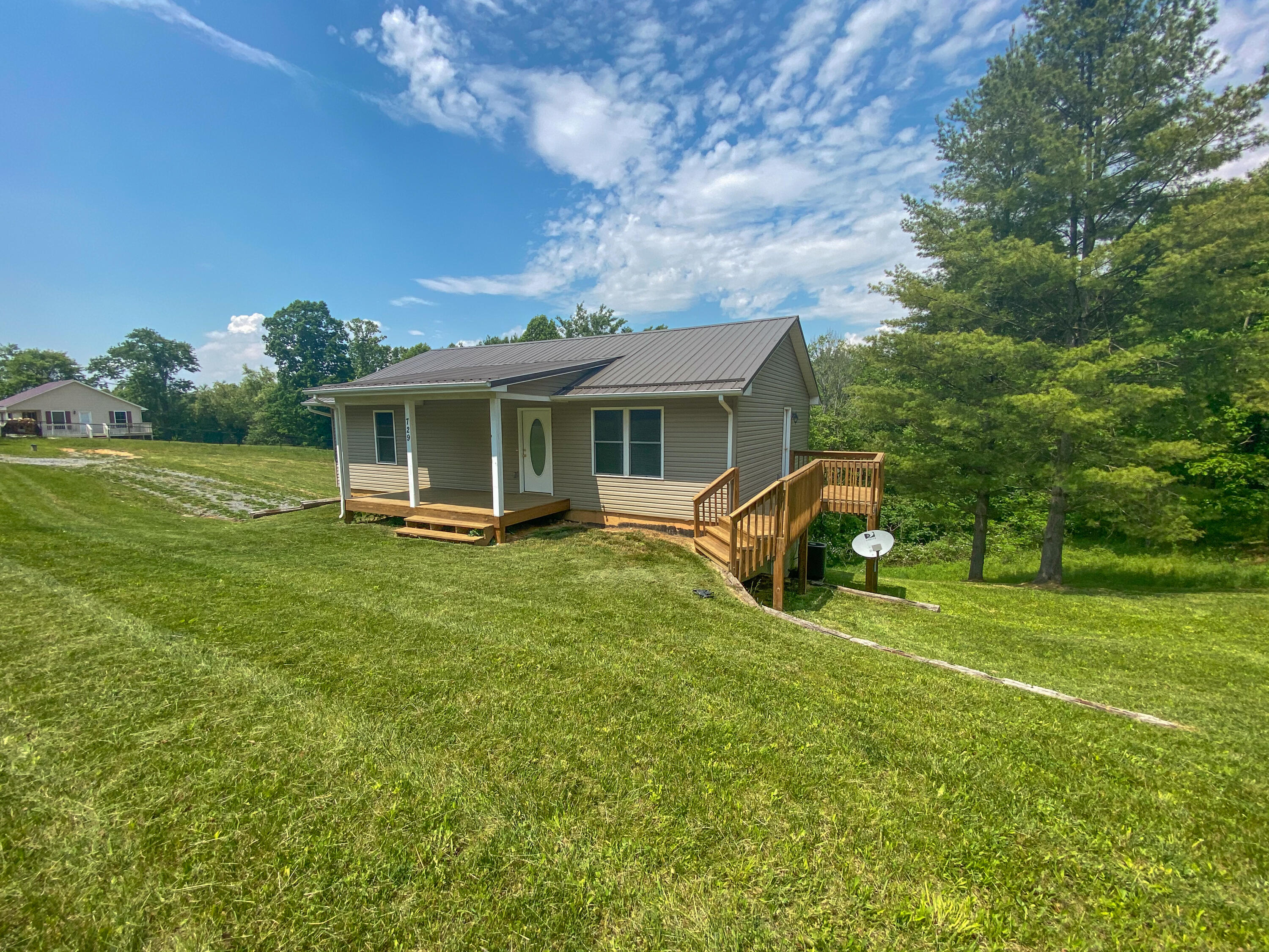 729 Huffville Road Northeast Pilot, VA 24138 - Photo 13 of 13 a view of a house with a backyard