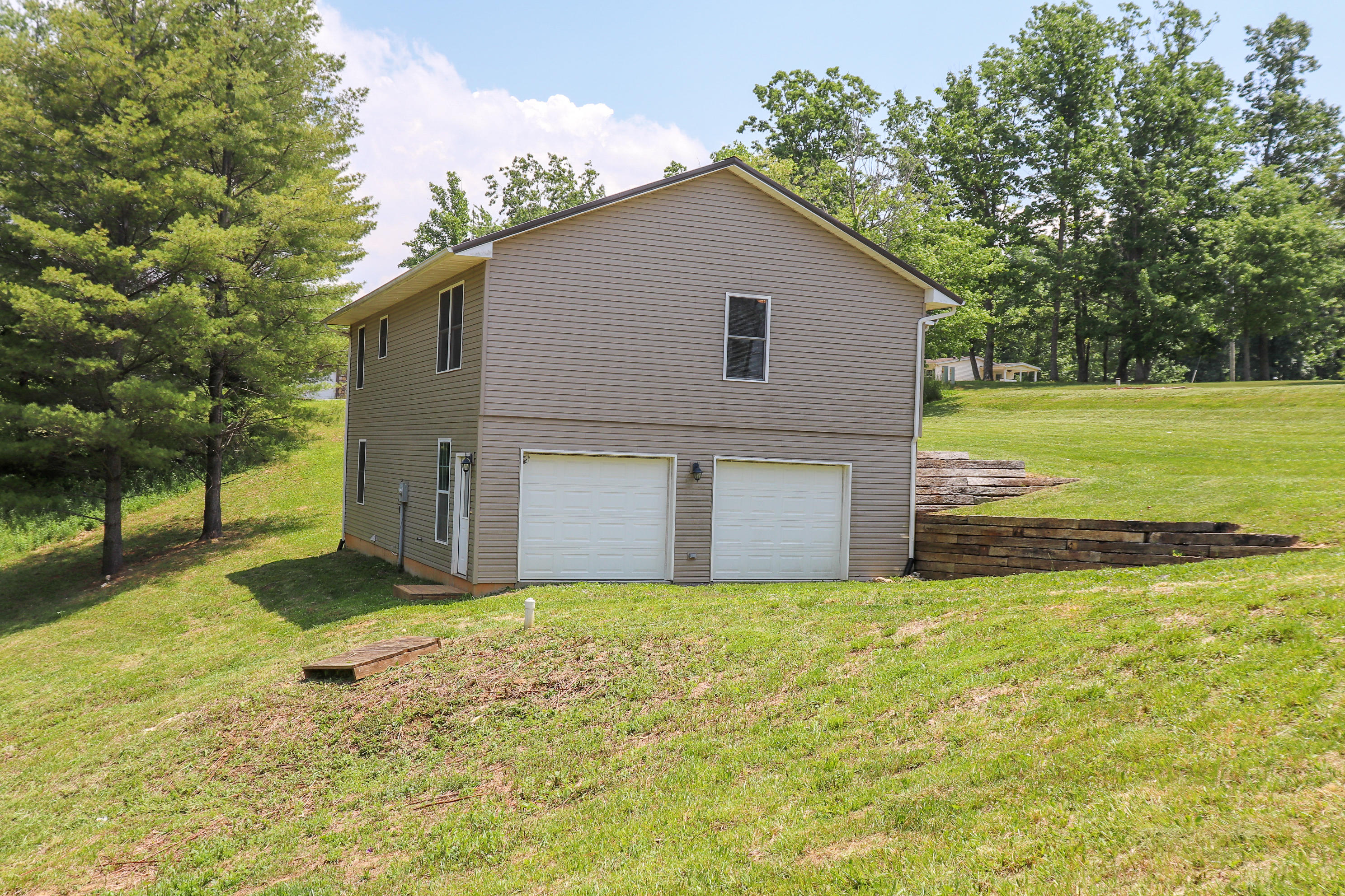 729 Huffville Road Northeast Pilot, VA 24138 - Photo 3 of 13 a view of a house with a yard