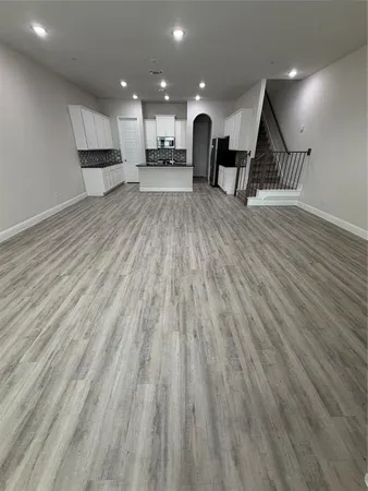 a view of kitchen with cabinets and outdoor view