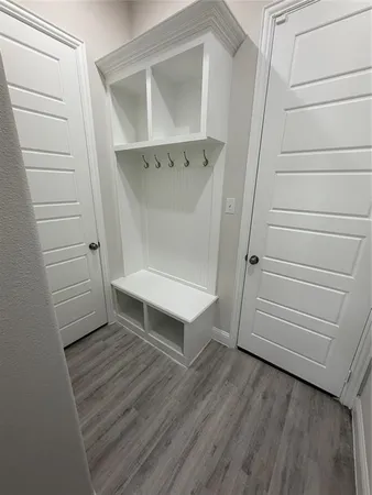 a view of an empty walk in closet